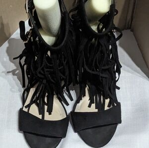 Wild diva lounge 4" heel with 3 layer buckle fringe. Size 10